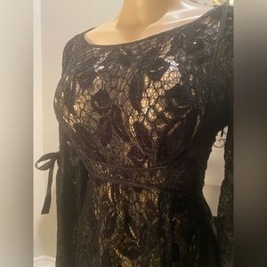 Free people brand little black dress with lace detail size: XS
